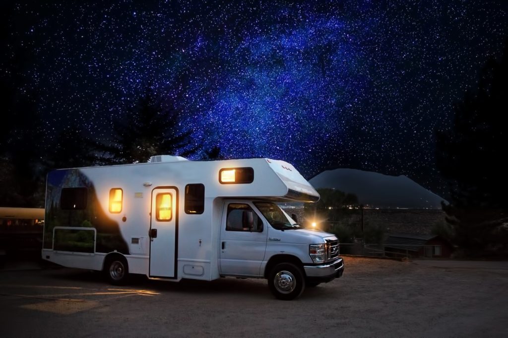 RV in campground at night