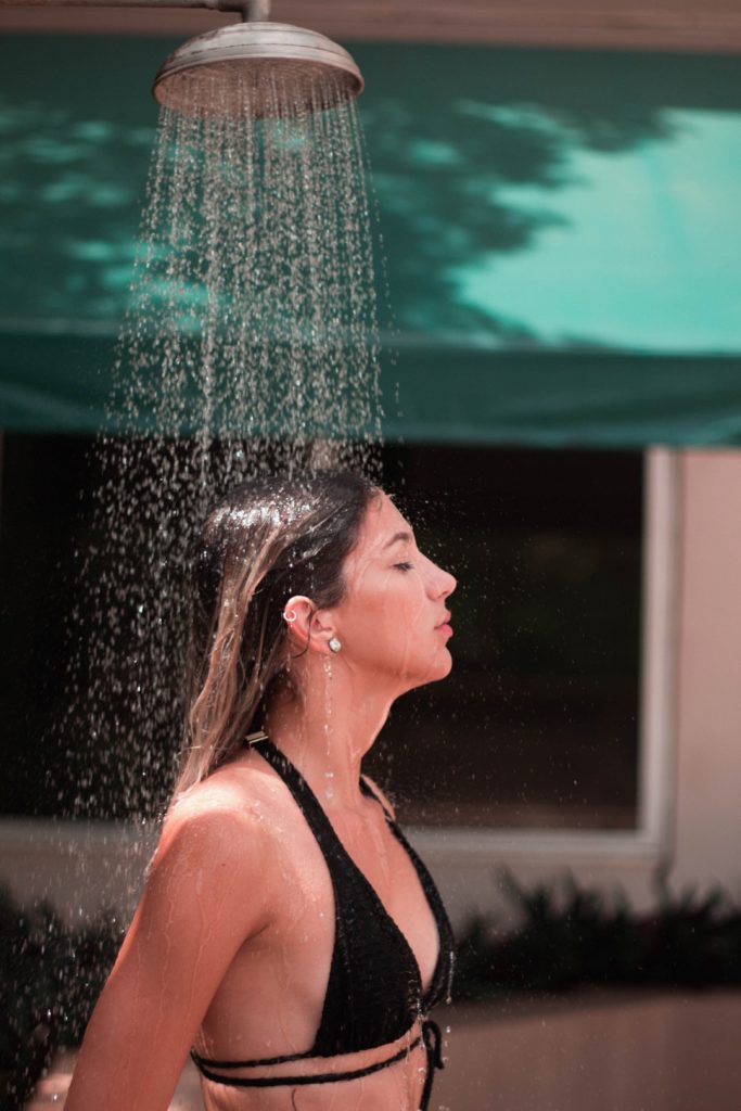 woman in outdoor shower