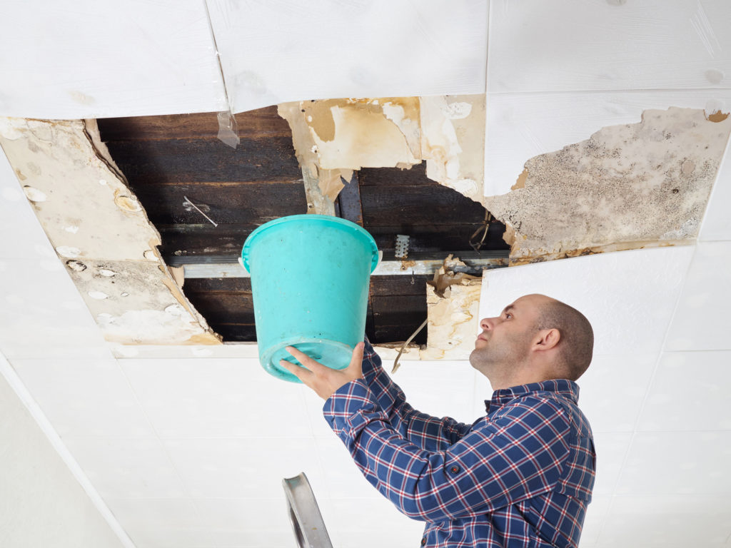 Man Doing Water Damage Cleanup